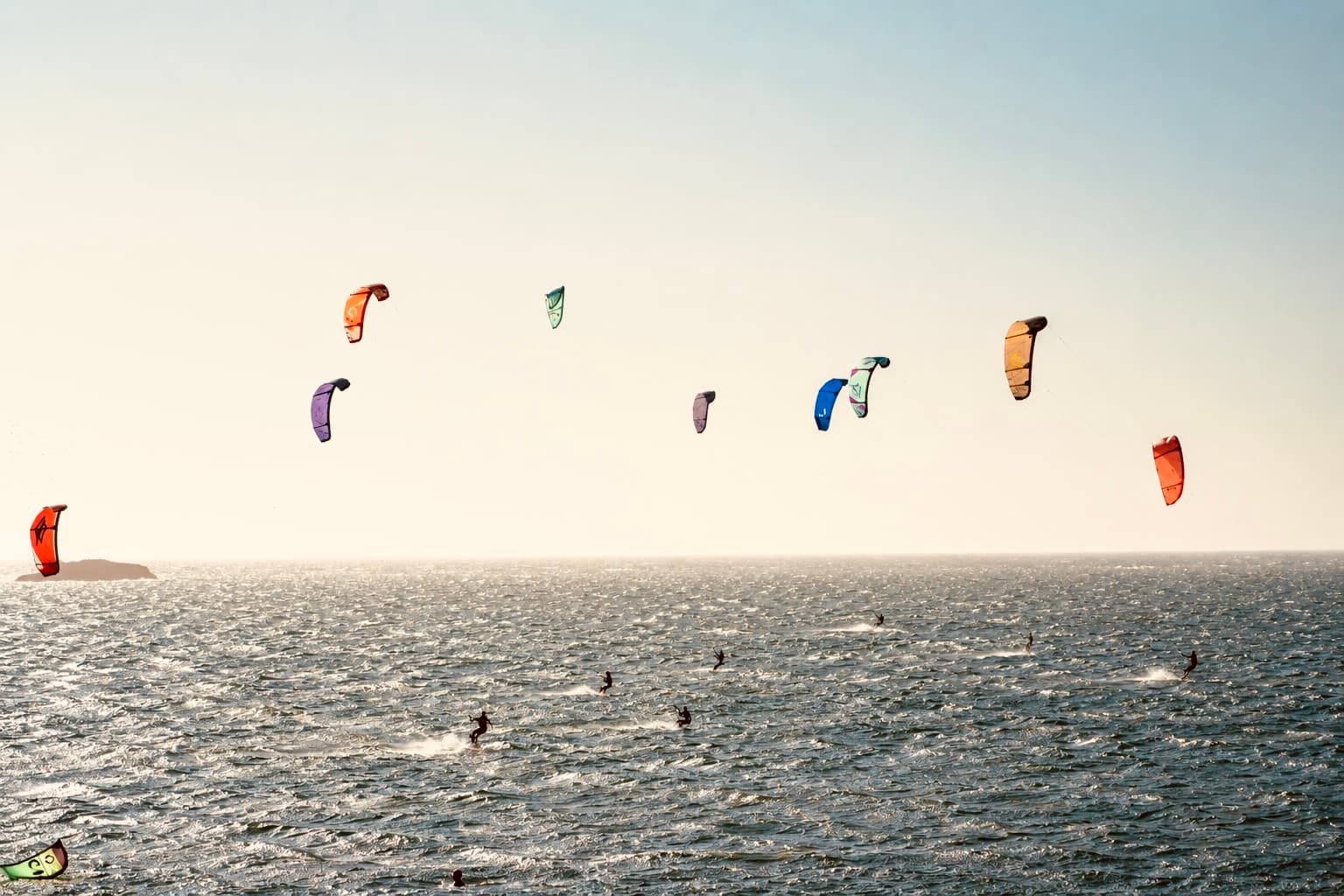 Colourful kites filling the sky over Essaouira bay
