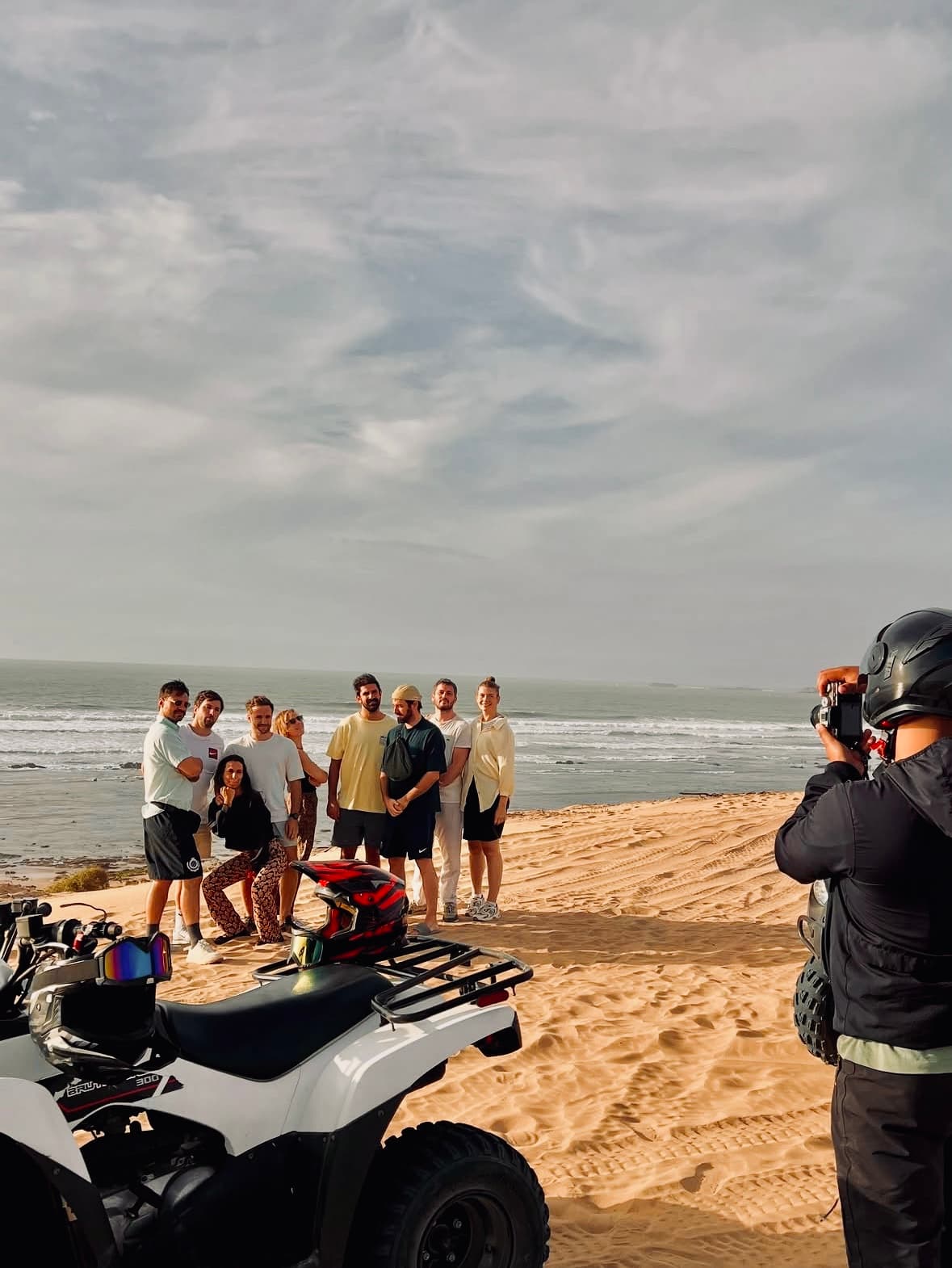 Group photo on the beach during a quad tour